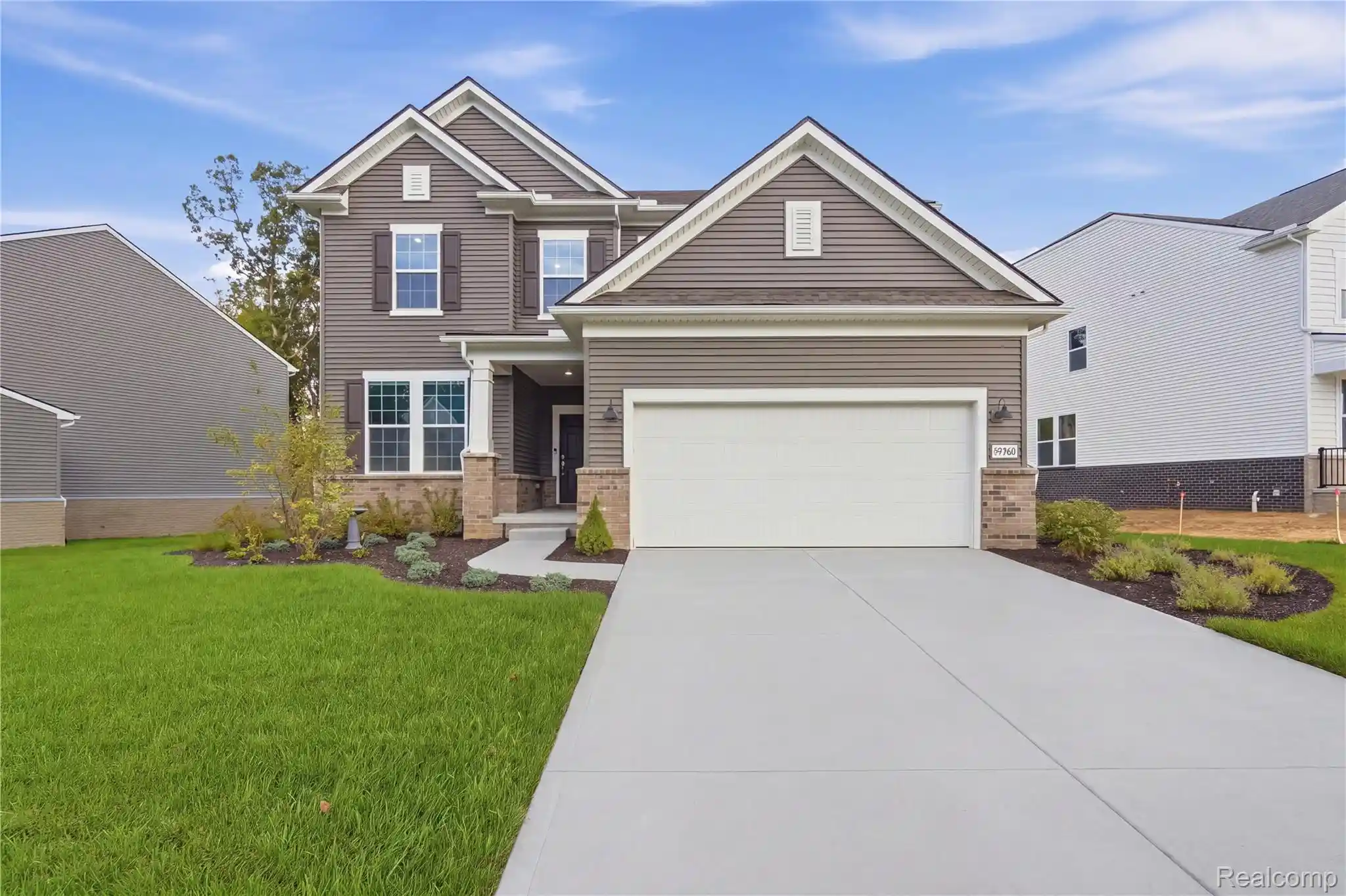 Single family home for sale at 59560 Schuss Gully Dr, New Hudson, MI 48165 | MLS# 20261085141