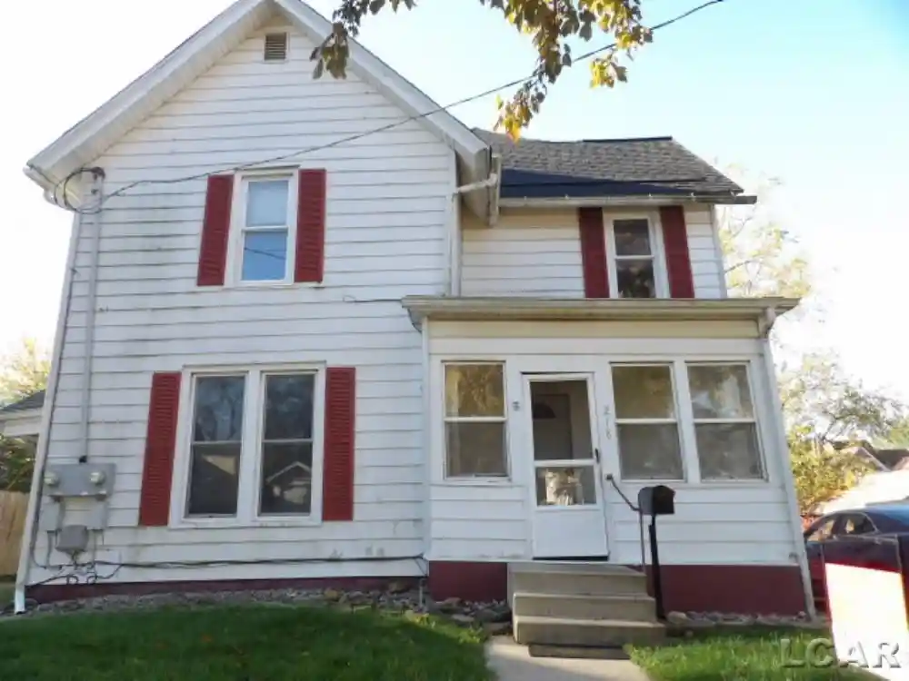 Photo 1 of Multi family home for sale at 218 E Hunt St, Adrian, MI 49221 | MLS# 56050225528 | Listing updated on 2026-10-21