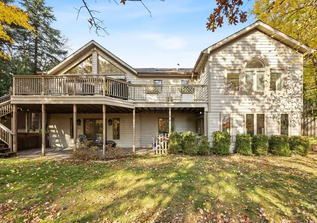 Single family home for sale at 5256 E Woodmeade Ct SE, Ada, MI 49301 | MLS# 65026057227