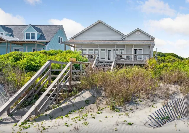 Photo 1 of Single family home for sale at 911 E Arctic Ave, Folly Beach, SC 29439 | MLS# 26021755 | Listing updated on 2026-09-11