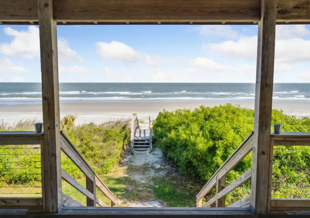 Photo 2 of Single family home for sale at 911 E Arctic Ave, Folly Beach, SC 29439 | MLS# 26021755 | Listing updated on 2026-09-11