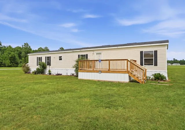 Photo 1 of Manufactured home for sale at 1442 Poplar Hl Dr, Ridgeville, SC 29472 | MLS# 26021680 | Listing updated on 2026-09-22