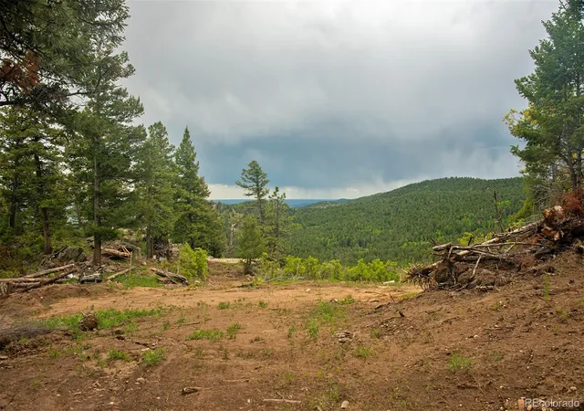 Photo 1 of Land for sale at 13864 N Trail Cir, Littleton, CO 80127 | MLS# 8176868 | Listing updated on 2026-02-06
