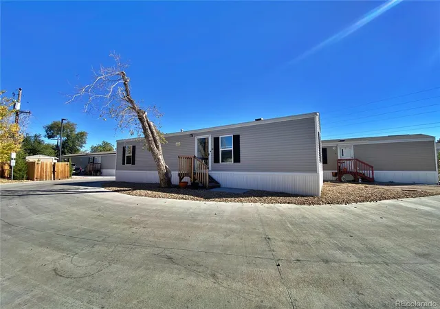 Photo 2 of Manufactured home for sale at 5971 E 69th Ave, Commerce City, CO 80022 | MLS# 2880200 | Listing updated on 2026-07-07