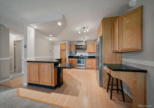 Photo 1 of Condo for sale at 715 S Alton Way #4B, Denver, CO 80247 | MLS# 8146742 | Listing updated on 2026-10-19