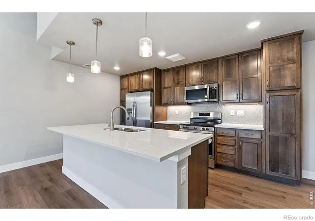 Photo 1 of Townhouse for sale at 235 High Point Dr #206, Longmont, CO 80504 | MLS# IR1040852 | Listing updated on 2026-10-14