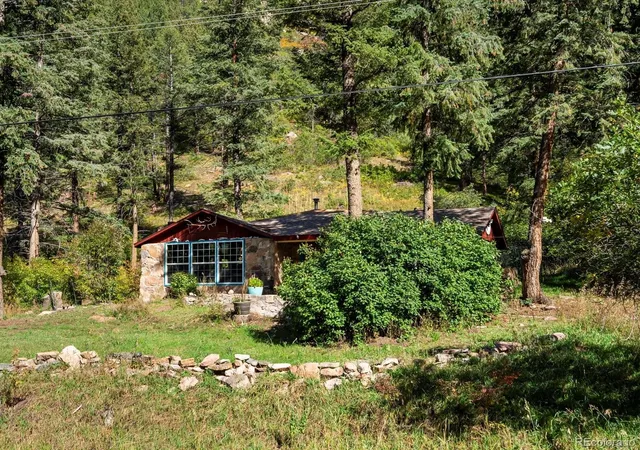 Photo 2 of Single family home for sale at 10230 S Deer Crk Rd, Littleton, CO 80127 | MLS# 7541265 | Listing updated on 2026-09-30