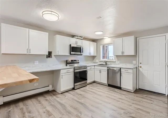 Photo 2 of Condo for sale at 5491 E Warren Ave #218, Denver, CO 80222 | MLS# 1597289 | Listing updated on 2026-09-16