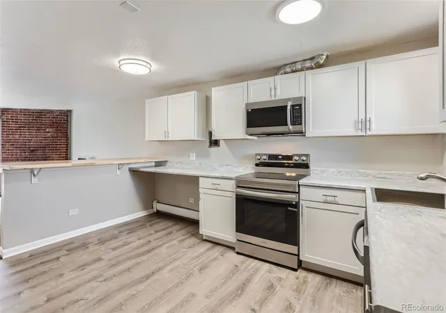Photo 3 of Condo for sale at 5491 E Warren Ave #218, Denver, CO 80222 | MLS# 1597289 | Listing updated on 2026-09-16