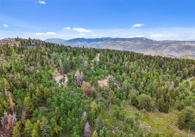 Photo 2 of Land for sale at 3665 Beaver Brk Cyn Rd, Evergreen, CO 80439 | MLS# 2035985 | Listing updated on 2026-09-06
