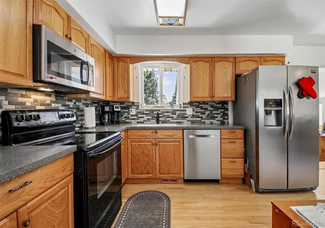 3rd image of 6164 S Eaton Ct, Littleton, CO 80123 | MLS# 9784857