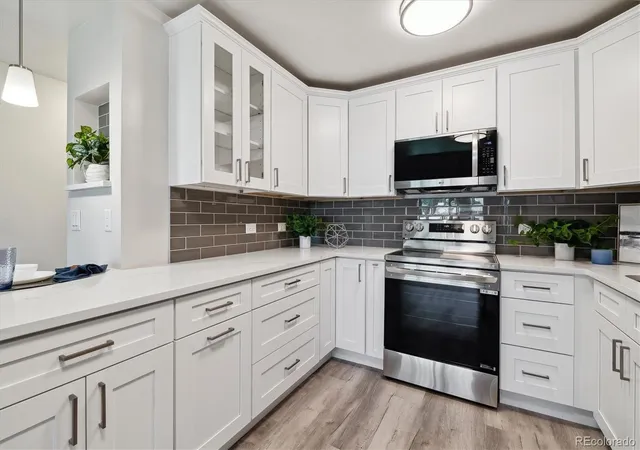 Listing Photo 1 - Condo for sale in building located at 715 S Alton Wy, Denver, CO 80247 - Unit #5A