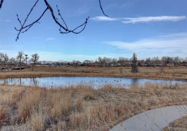 Listing Photo 2 - Condo for sale in building located at 14280 E 22nd Pl, Aurora, CO 80011 - Unit #