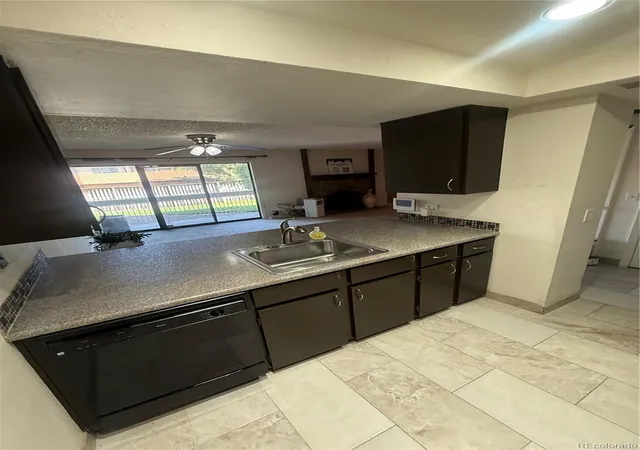 Photo 4 of Condo for sale at 4896 S Dudley St #9-4, Littleton, CO 80123 | MLS# 6422610 | Listing updated on 2026-09-21