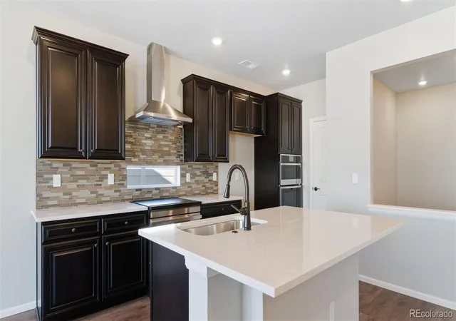 Photo 3 of Single family home for sale at 5161 N Quatar St, Aurora, CO 80019 | MLS# 7085054 | Listing updated on 2026-10-23