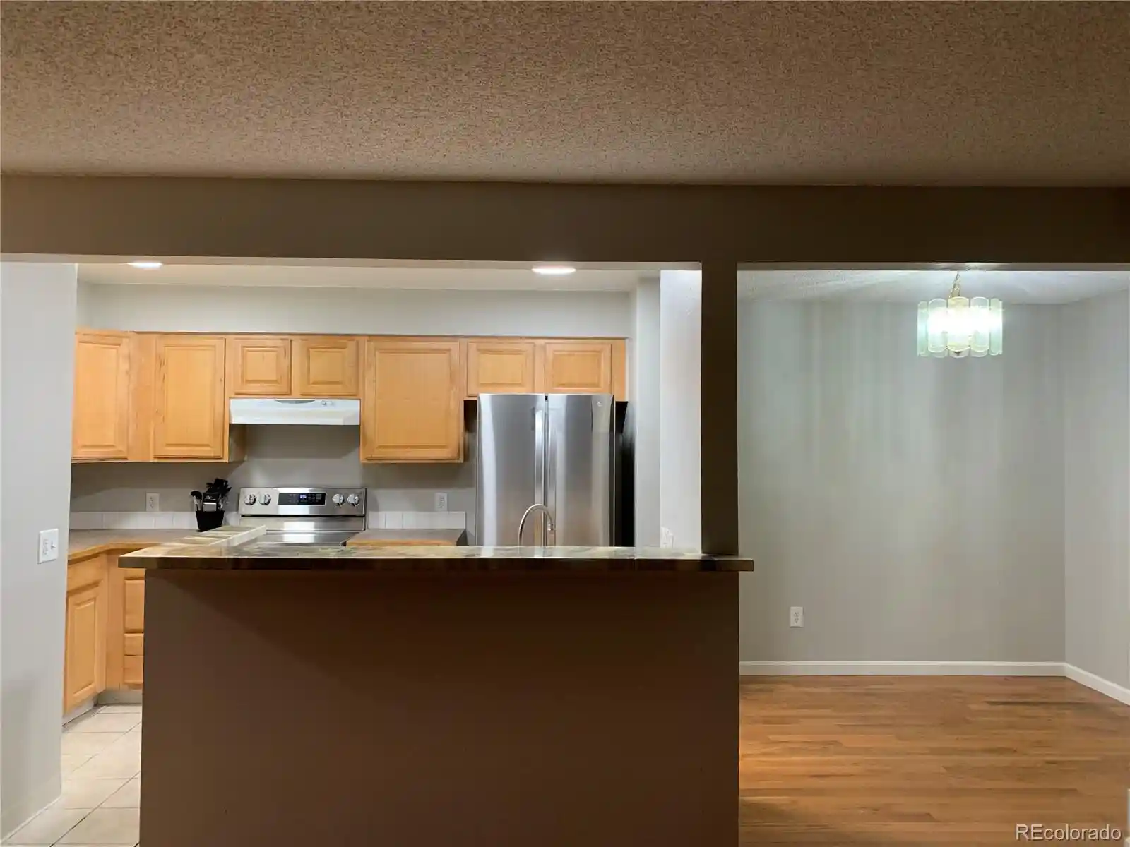 Listing Photo 2 - Condo for sale in 14602 E 2nd Ave located at 14602 E 2nd Ave, Aurora, CO 80011 - Unit #109C