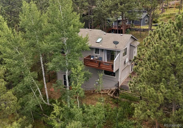 Photo 3 of Single family home for sale at 29895 Spruce Rd, Evergreen, CO 80439 | MLS# 9962088 | Listing updated on 2026-08-27