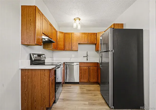 Photo 3 of Condo for sale at 2120 S Vaughn Way #102F, Aurora, CO 80014 | MLS# 8804306 | Listing updated on 2026-10-09
