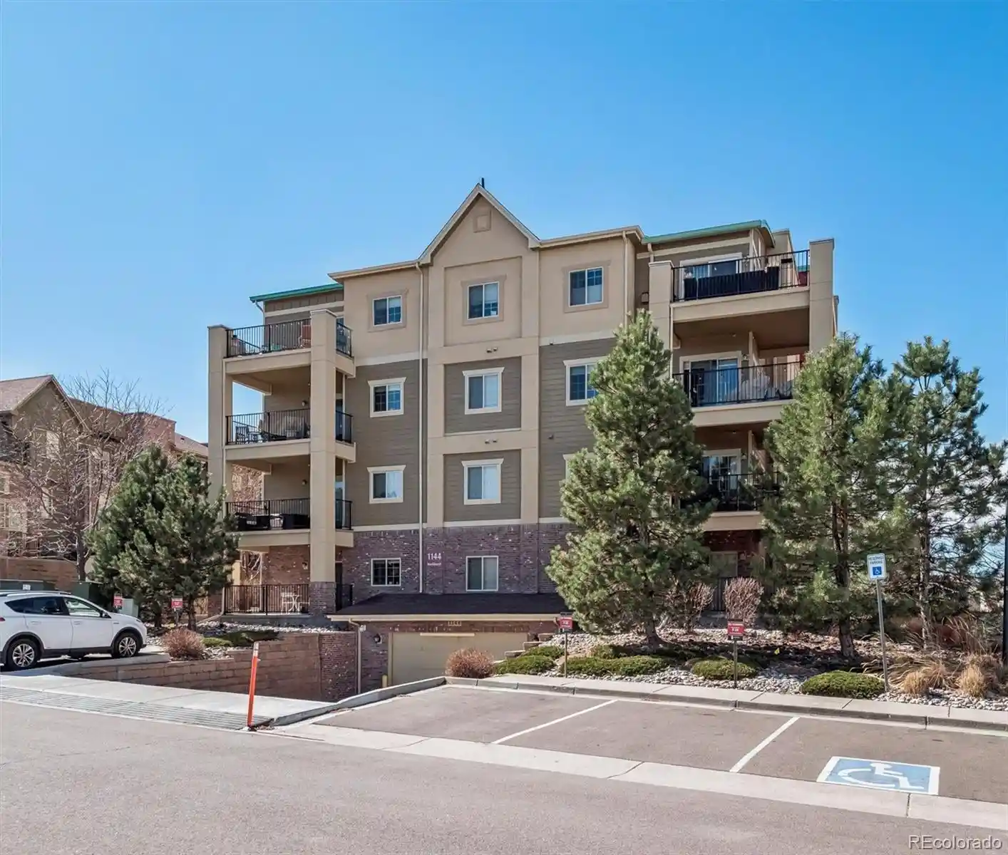 Listing Photo 1 - Condo for sale in 1144 Rockhurst Dr located at 1144 Rockhurst Dr, Highlands Ranch, CO 80129 - Unit #107