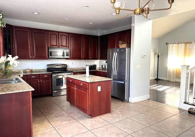 Photo 2 of Single family home for sale at 9826 Nucla St, Commerce City, CO | MLS# 6480200 | Listing updated on 2026-10-05