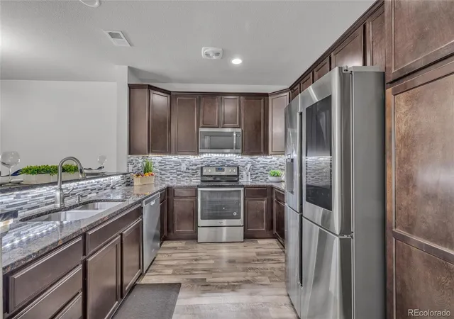 Photo 3 of Townhouse for sale at 1877 S Buchanan Cir, Aurora, CO 80018 | MLS# 4372725 | Listing updated on 2026-10-01