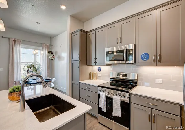 Photo 1 of Townhouse for sale at 420 High Point Dr #104, Longmont, CO 80504 | MLS# 9934172 | Listing updated on 2026-04-09