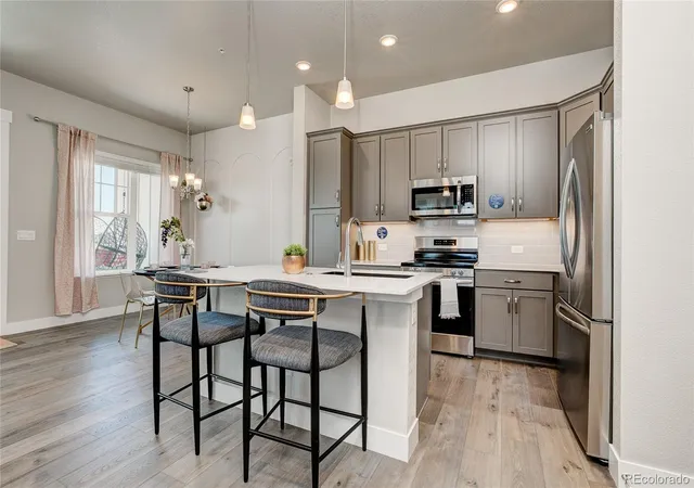 Photo 2 of Townhouse for sale at 420 High Point Dr #104, Longmont, CO 80504 | MLS# 9934172 | Listing updated on 2026-04-09