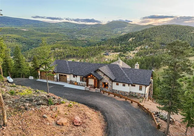 Photo 3 of Single family home for sale at 32643 Lodgepole Cir, Evergreen, CO 80439 | MLS# 2806353 | Listing updated on 2026-10-01