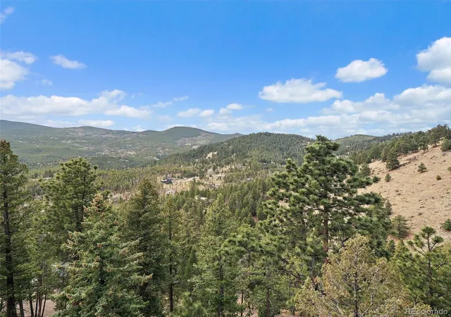 Photo 4 of Single family home for sale at 32643 Lodgepole Cir, Evergreen, CO 80439 | MLS# 2806353 | Listing updated on 2026-10-01