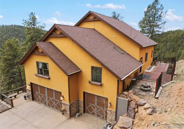 Photo 3 of Single family home for sale at 12810 Rampart Range Rd, Woodland Park, CO 80863 | MLS# 7175010 | Listing updated on 2026-09-29