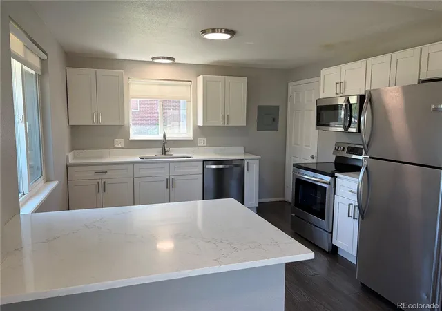 1st image of 11036, 11038 E 4th Wy, Aurora, CO 80010 | MLS# 6370251