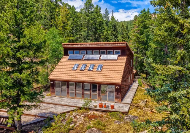 Photo 3 of Single family home for sale at 29821 Kings Valley E, Conifer, CO 80433 | MLS# 5274210 | Listing updated on 2026-09-03