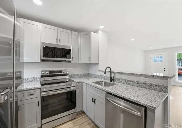 Photo 3 of Townhouse for sale at 9800 W Cornell Pl, Lakewood, CO 80227 | MLS# 2802689 | Listing updated on 2026-09-08