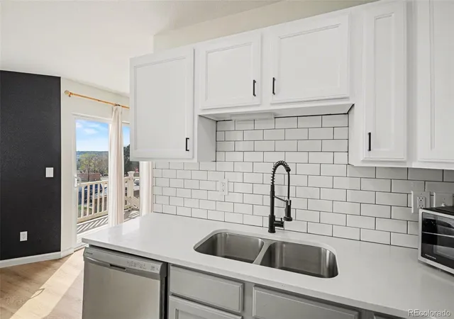 Photo 3 of Townhouse for sale at 3200 S Federal Blvd #2-5, Denver, CO 80236 | MLS# 7215957 | Listing updated on 2026-10-03