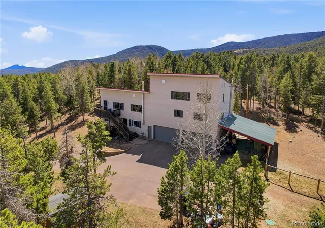 Photo 2 of Single family home for sale at 9225 Sandy Ln, Conifer, CO 80433 | MLS# 3640050 | Listing updated on 2026-10-28