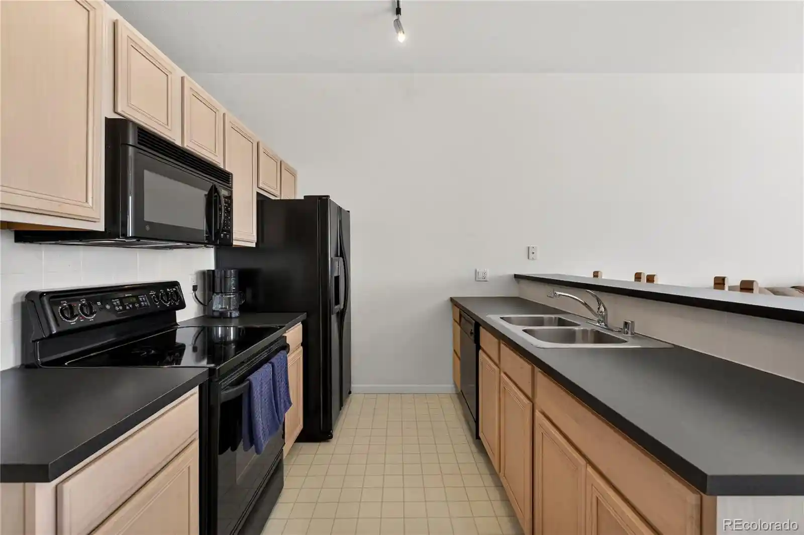 Listing Photo 2 - Condo for sale in 15475 Andrews Dr located at 15475 Andrews Dr, Denver, CO 80239 - Unit #406