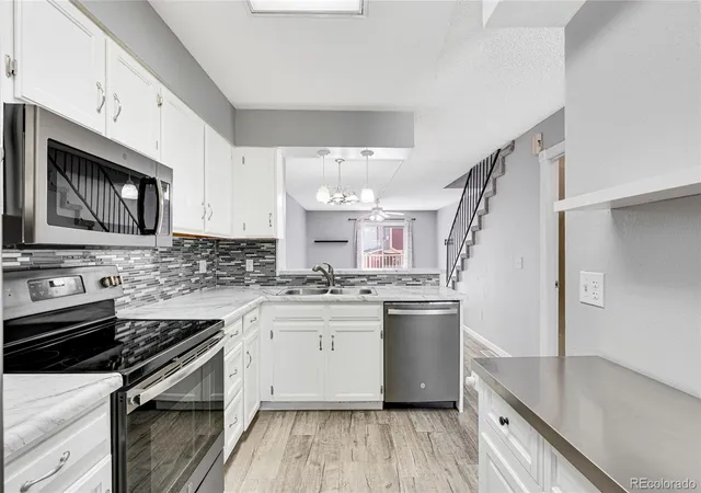 Photo 4 of Townhouse for sale at 6712 S Holland Way, Littleton, CO 80128 | MLS# 4181643 | Listing updated on 2026-10-06