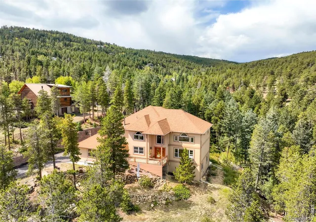 Photo 1 of Single family home for sale at 12023 Coal Crk Hts Dr, Golden, CO 80403 | MLS# IR1056125 | Listing updated on 2026-08-21