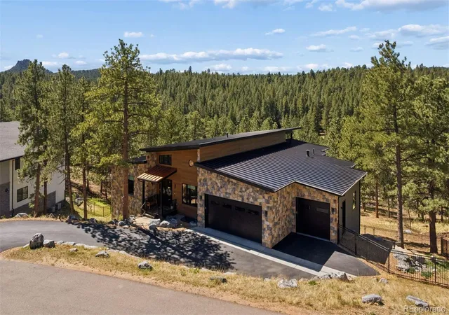Photo 2 of Single family home for sale at 28248 Lone Elk Trl, Evergreen, CO 80439 | MLS# 6959680 | Listing updated on 2026-10-14
