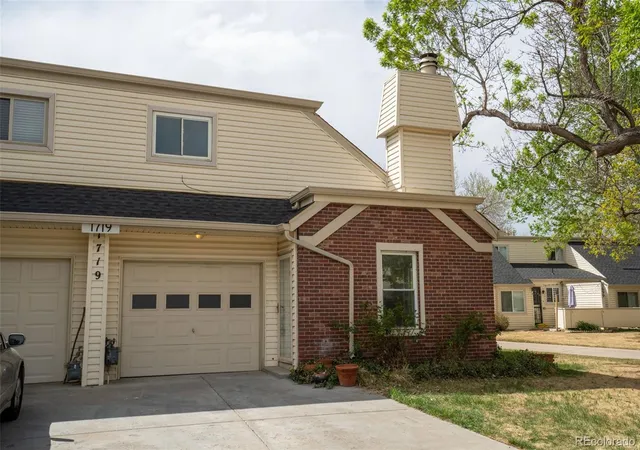 Photo 1 of Townhouse for sale at 1719 S Lee St #D, Lakewood, CO 80232 | MLS# 2338886 | Listing updated on 2026-09-11