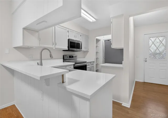 Photo 3 of Townhouse for sale at 3209 S Estes St, Lakewood, CO 80227 | MLS# 7607158 | Listing updated on 2026-08-06