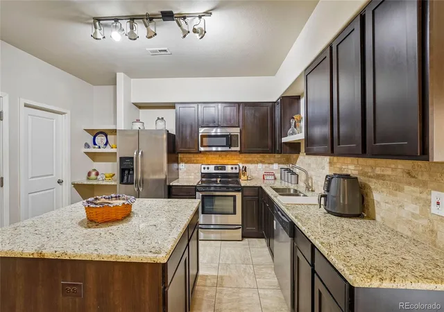 Photo 3 of Condo for sale at 3611 S Perth Cir #102, Aurora, CO 80013 | MLS# 5578587 | Listing updated on 2026-10-20