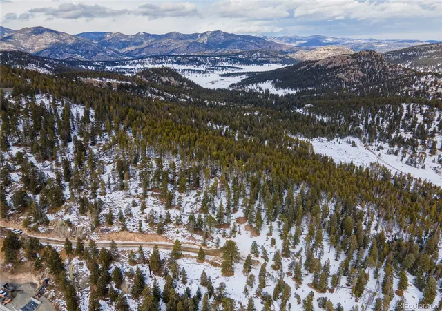 Photo 3 of Land for sale at 32613 Lodgepole Cir, Evergreen, CO 80439 | MLS# 2452466 | Listing updated on 2026-06-27