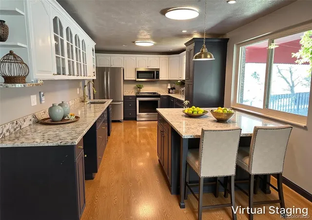 Photo 2 of Single family home for sale at 12720 W 6th Place, Lakewood, CO 80401 | MLS# 4649044 | Listing updated on 2026-08-12