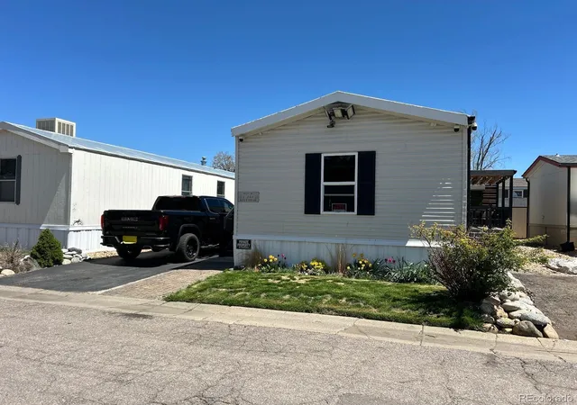 Photo 1 of Manufactured home for sale at 14470 E 13th Avenue, Aurora, CO 80011 | MLS# 4292537 | Listing updated on 2026-10-27