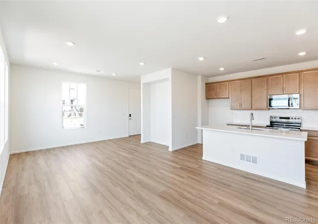 Photo 4 of Townhouse for sale at 589 N Bently St, Watkins, CO 80137 | MLS# 4927390 | Listing updated on 2026-09-22