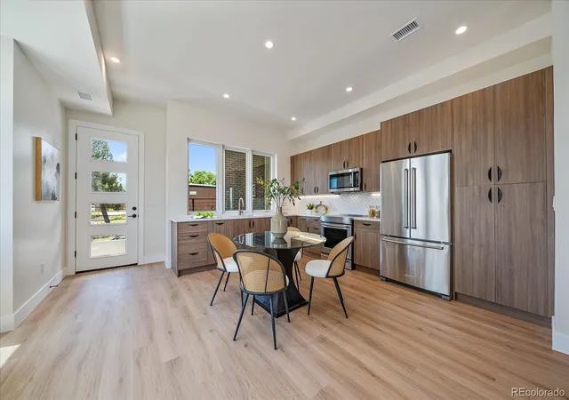 Photo 3 of Townhouse for sale at 1370 Lowell Blvd #1, Denver, CO 80204 | MLS# 9219107 | Listing updated on 2026-09-08