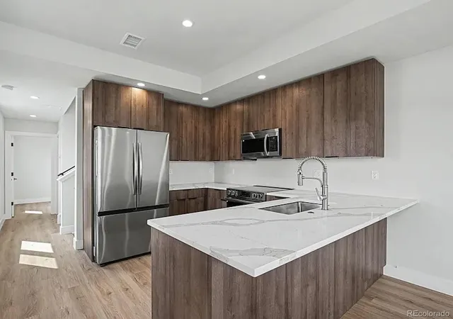 Photo 2 of Townhouse for sale at 1370 Lowell Blvd #3, Denver, CO 80204 | MLS# 3727679 | Listing updated on 2026-09-24