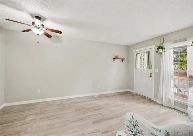 Photo 3 of Townhouse for sale at 10406 W Dartmouth Ave, Lakewood, CO 80227 | MLS# 9287838 | Listing updated on 2026-09-03