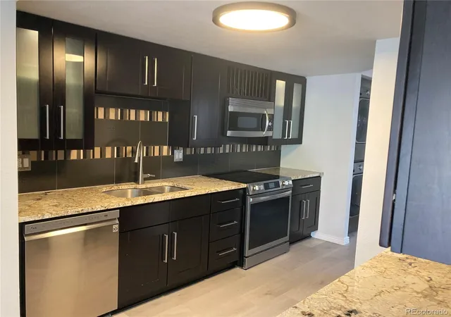 Photo 3 of Townhouse for sale at 5966 S Jellison St #B, Littleton, CO 80123 | MLS# 9670631 | Listing updated on 2026-10-04